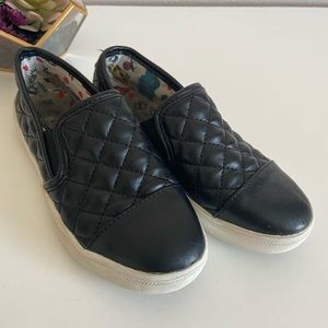Steve Madden black patent quilted slip on.